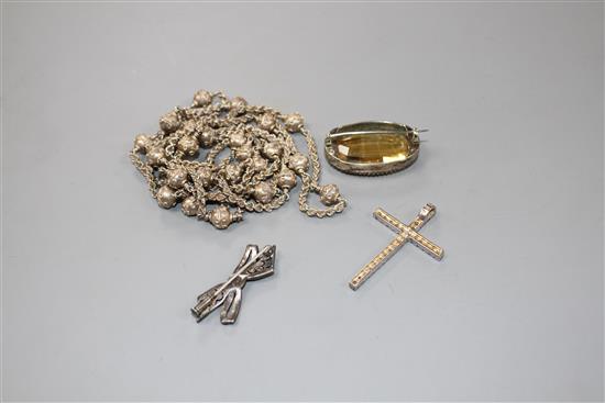 White metal jewellery to include a citrine? mounted brooch, a filigree work necklace, a marcasite set bow brooch & pendant.